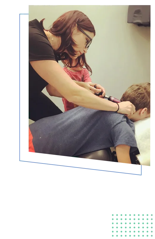 Chiropractor Memphis TN Lindsey Carr Adjusting Child